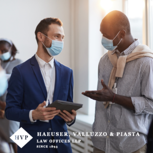 men talking with masks on their faces